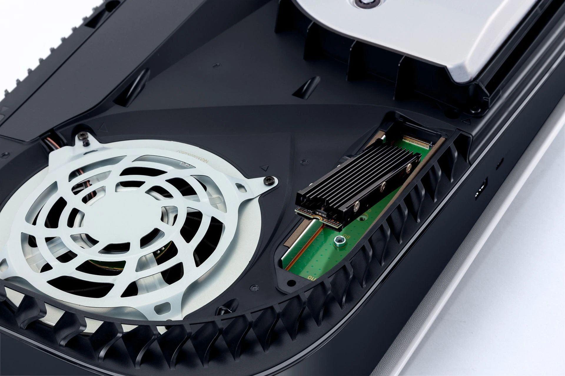 PS5 M.2 SSD slot open with installed NVMe drive